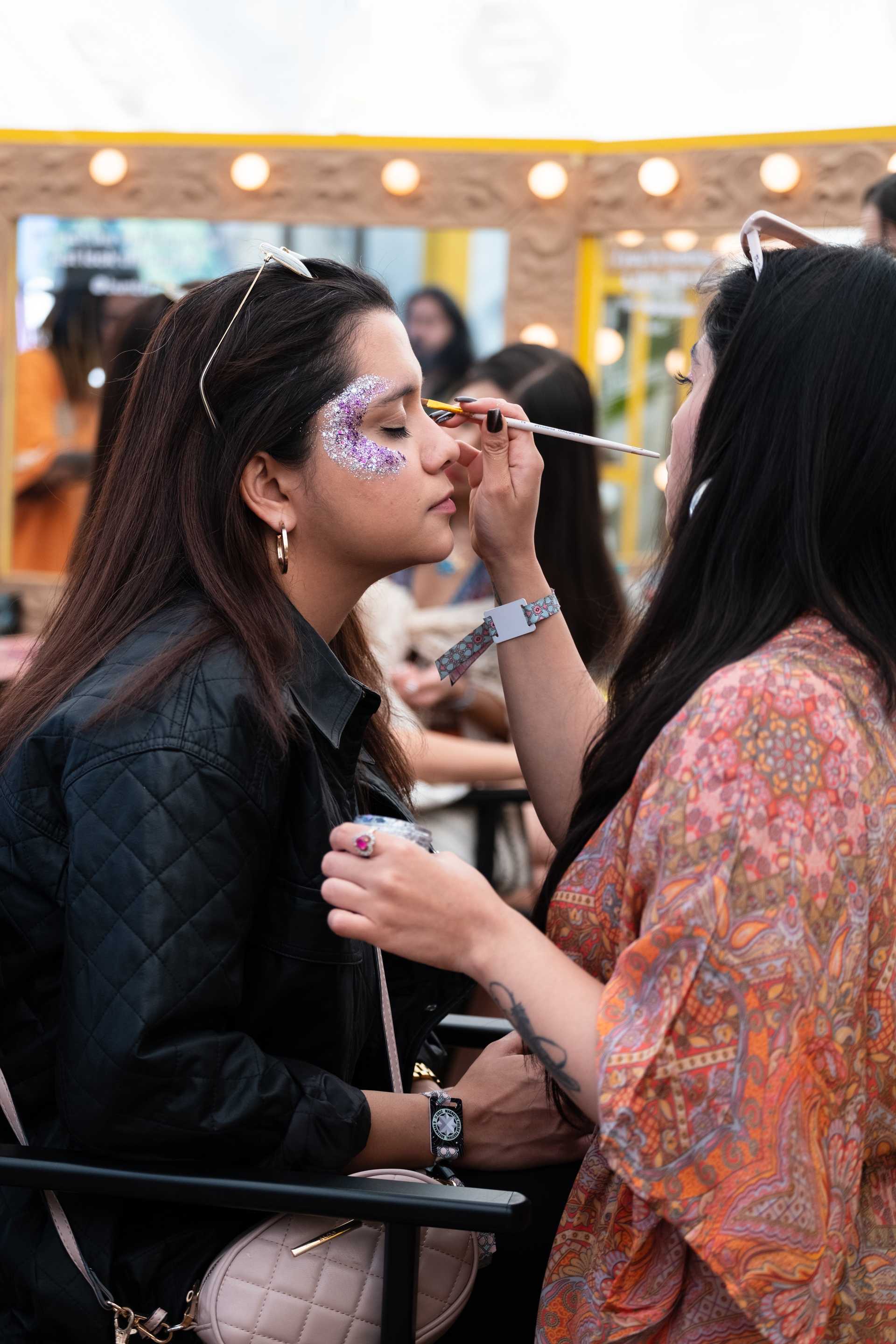An attendee gets festival ready at Bumble Hive - Imgae credit - Aarohi Mishra